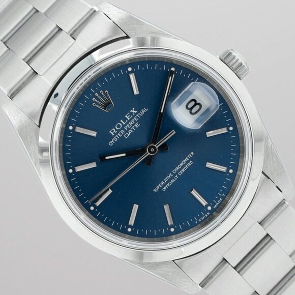 Rolex Oyster Perpetual Date 34mm Steel Blue Dial Smooth Bezel